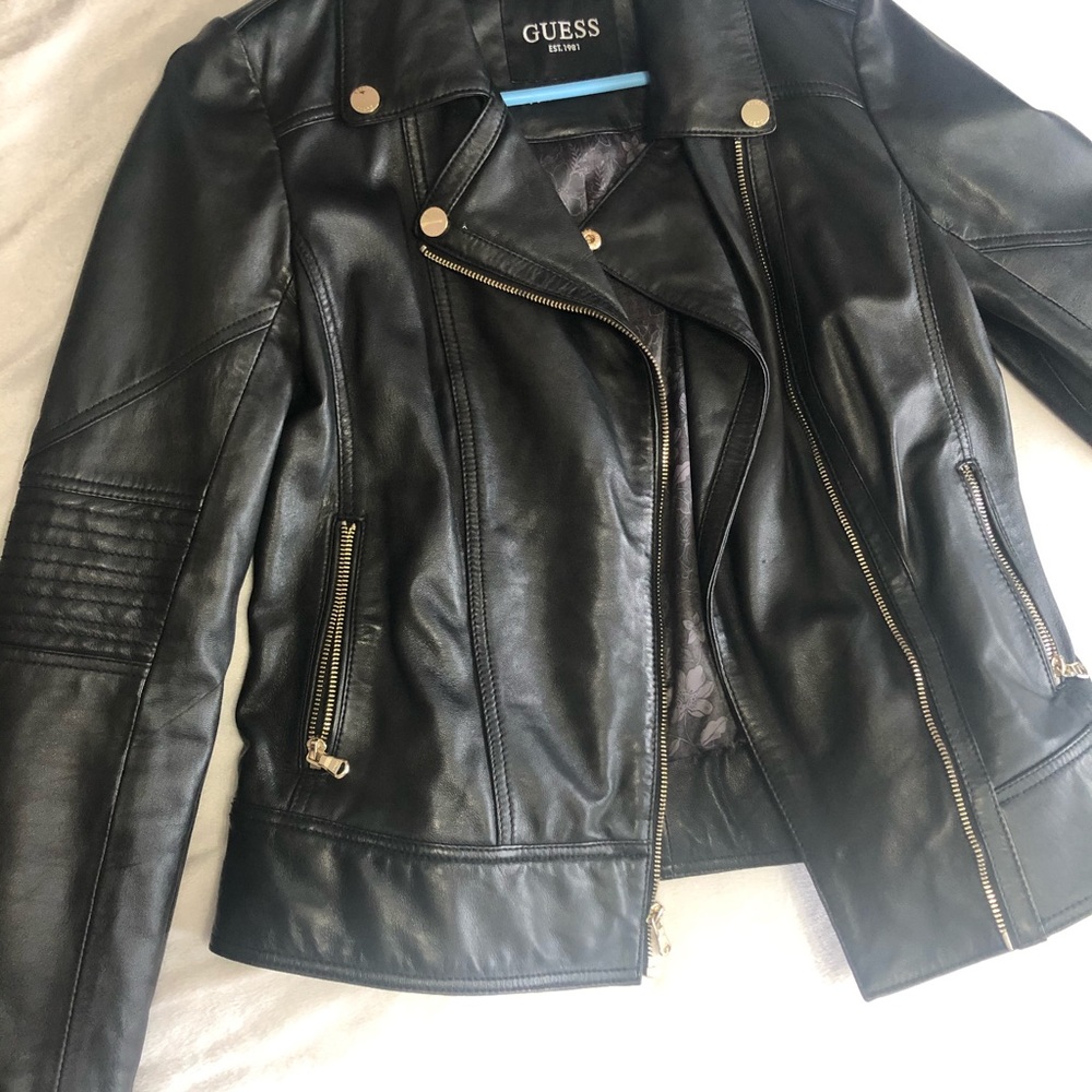 Guess black leather jacket. Used but gently warn Excellent condition